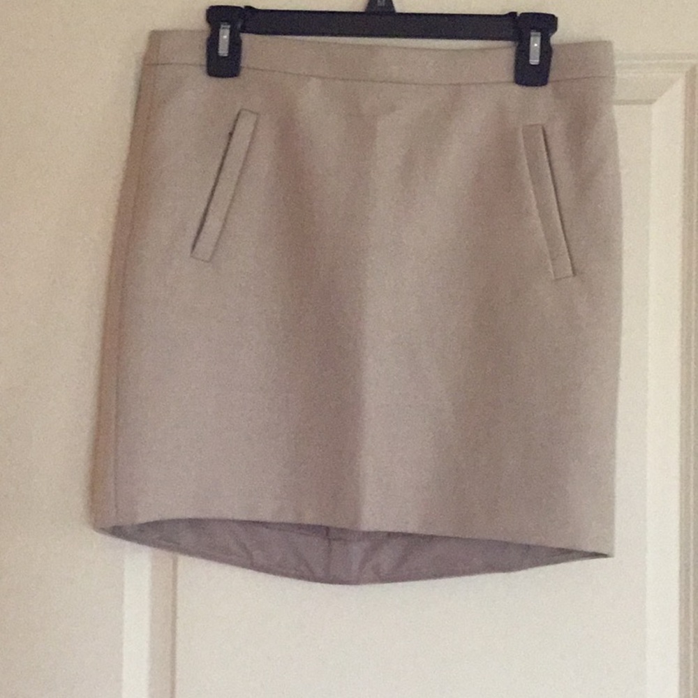 Tan low high wool skirt zipper pockets
